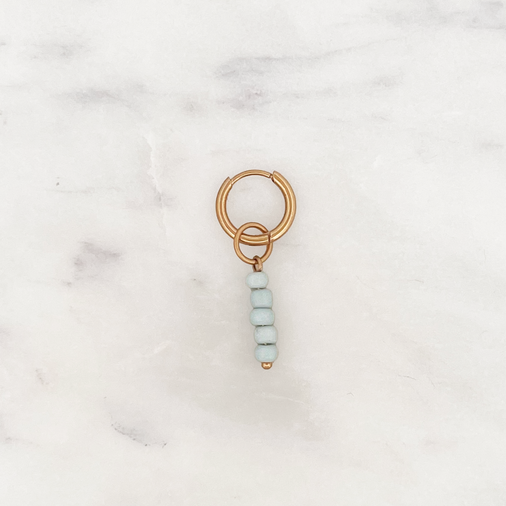Tiny Huggie Pale Blue Beads Tiny Huggie Pale Blue Beads