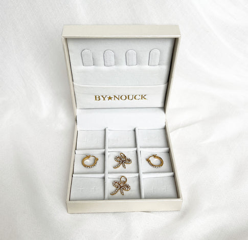 Ensemble de boucles d'oreilles nœuds brillants
